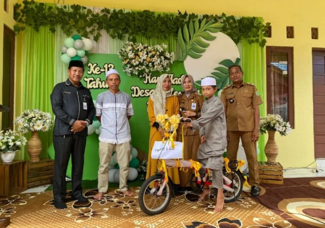 
 Peringati Hari Jadi Desa Yang Ke-13 Desa Polewali Marajae Berikan Hadiah Sepeda Kepada Anak Penghafal Qur,an